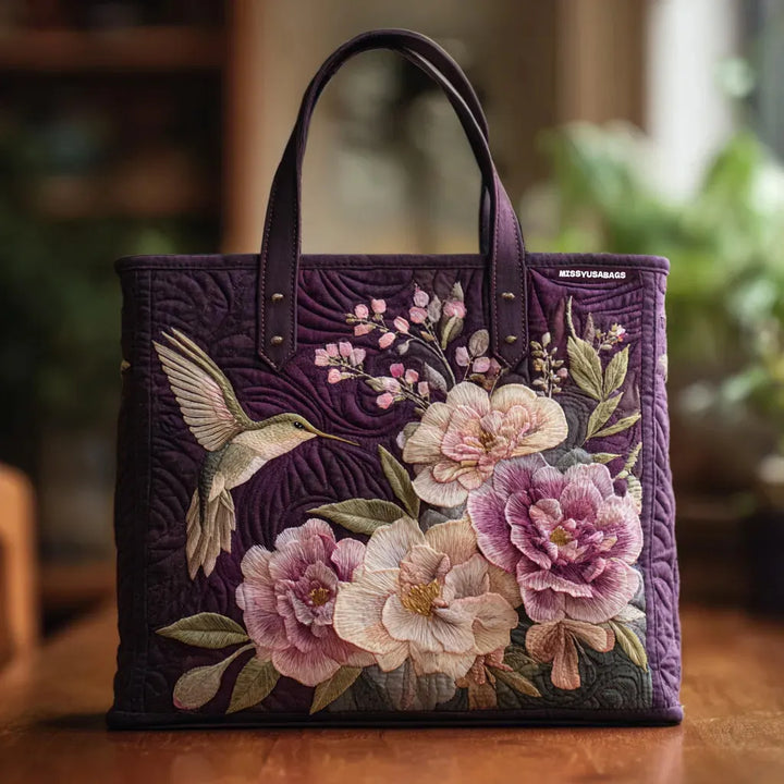 Borsa tote trapuntata con viole, colibrì e orchidee