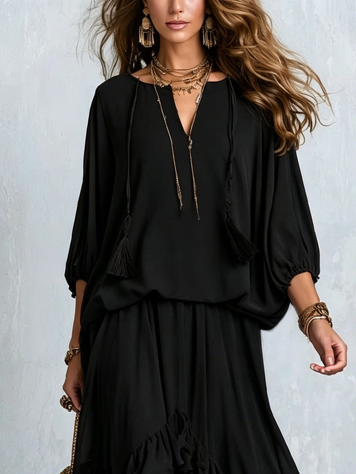 Elvira | Completo con top nero in chiffon con scollo a V e frange abbinato a gonna a balze a strati