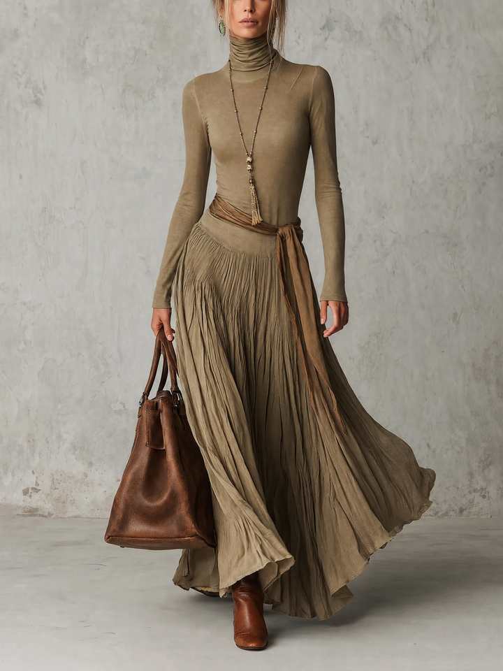 Júlia - Elegante abito maxi plissettato a collo alto e maniche lunghe con fiocco in vita